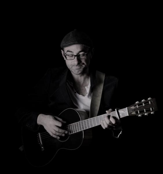 Le musicien Le guitariste Armand Boisard